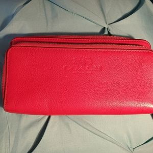 Hot pink Coach leather wallet with wristlet